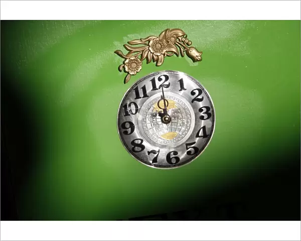 Clock on green background