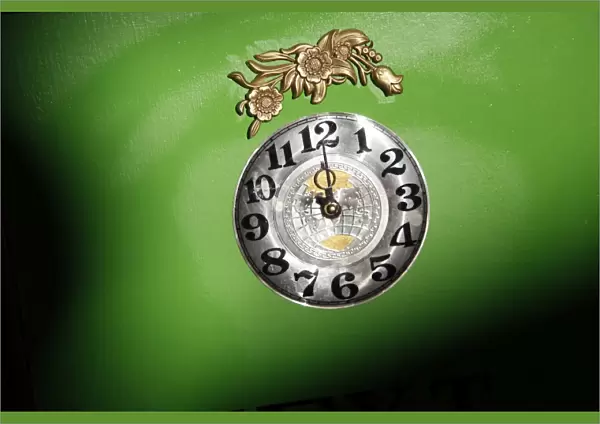 Clock on green background
