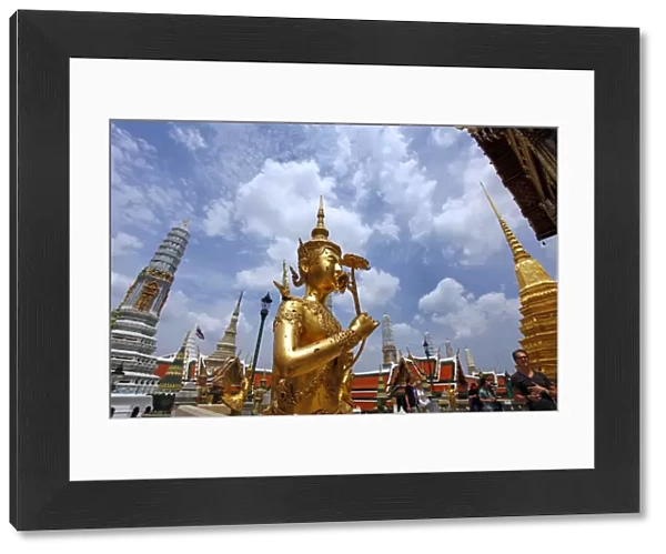 Golden Kinnara statue at the Grand Palace Complex, Wat Phra Kaew, Bangkok, Thailand