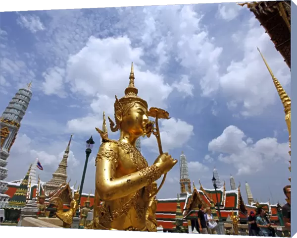 Golden Kinnara statue at the Grand Palace Complex, Wat Phra Kaew, Bangkok, Thailand