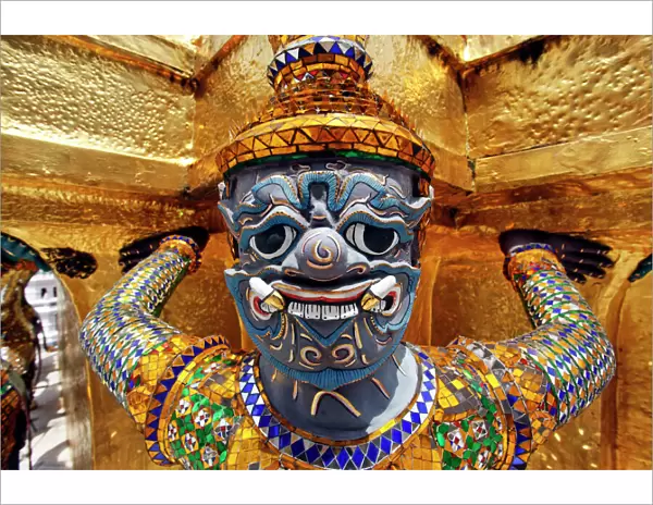 Spot colour Yaksha Demon Statue at Wat Phra Kaew temple, Bangkok, Thailand