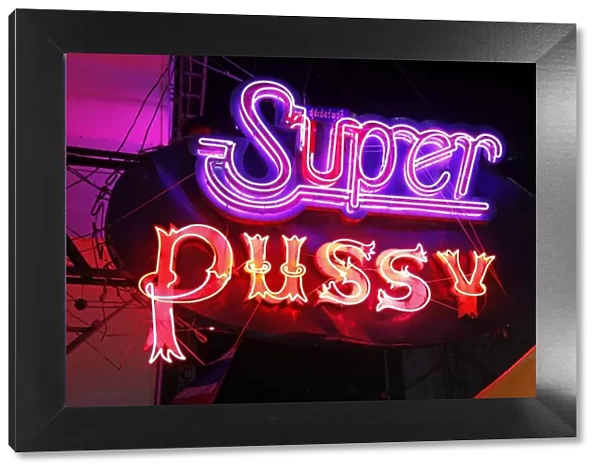 Super pussy neon sign in Patpong Night Market in Bangkok, Thailand