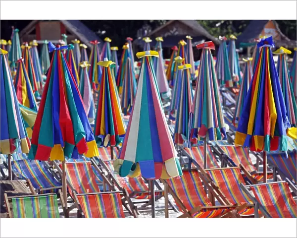 Colourful beach umbrellas on Khai Nok Island, Phuket, Thailand