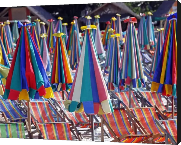 Colourful beach umbrellas on Khai Nok Island, Phuket, Thailand