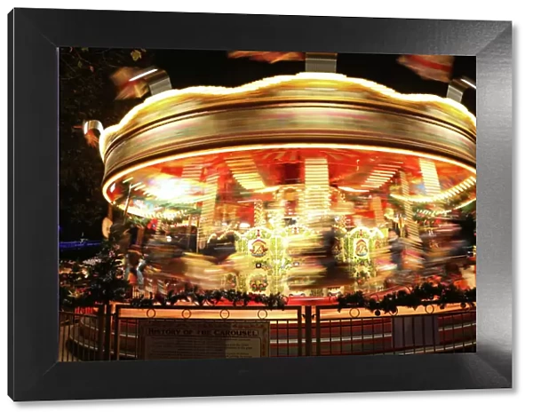 Motion blur view of a Merry go round carousel in London