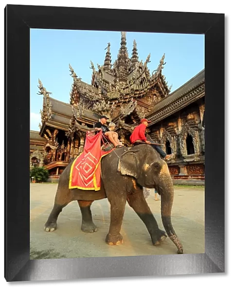 Elephant Tour for tourists at the Sanctuary of Truth Temple, Prasat Sut Ja-Tum, Pattaya, Thailand