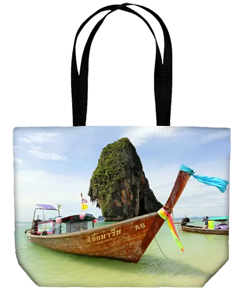 Traditional Thai long tail boat at Phranang Cave Beach, Railay Beach, Krabi, Phuket, Thailand