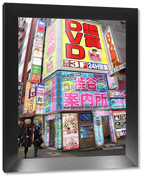 Street scene of DVD Shop and Japanese shop signs in Shibuya, Tokyo, Japan