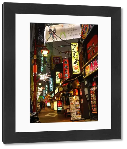 Night street scene of the restaurants and back alleys of Shinjuku, Tokyo, Japan