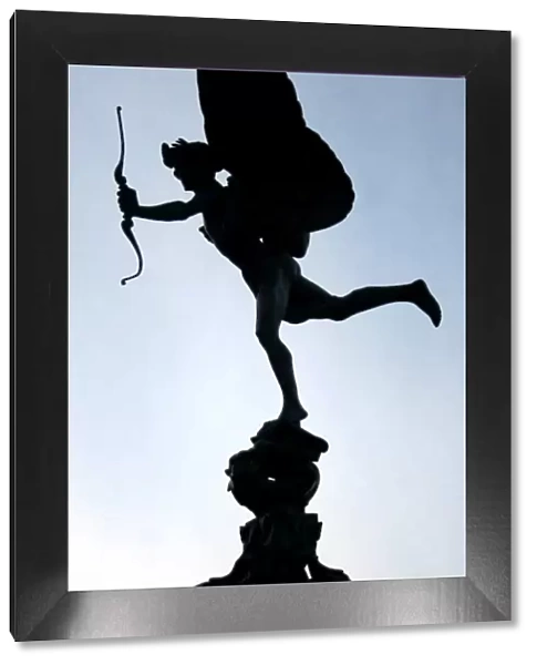 Silhouette of the statue of Eros, Piccadilly Circus, London, England