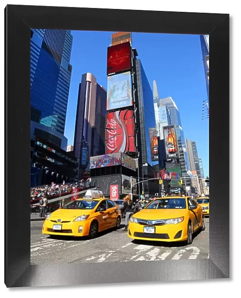 Yellow taxi cabs in Times Square, New York. America