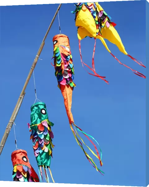 Tourist souvenirs, colourful kites on Legian Beach, Denpasar, Bali, Indonesia