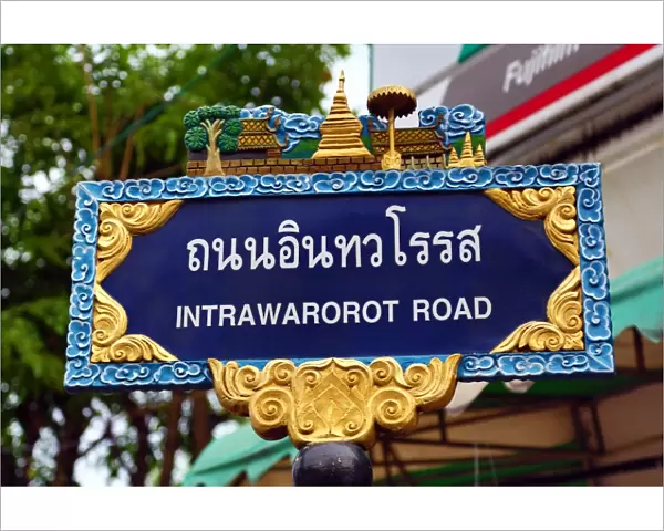 Intrawarorot Road street sign in Chiang Mai, Thailand