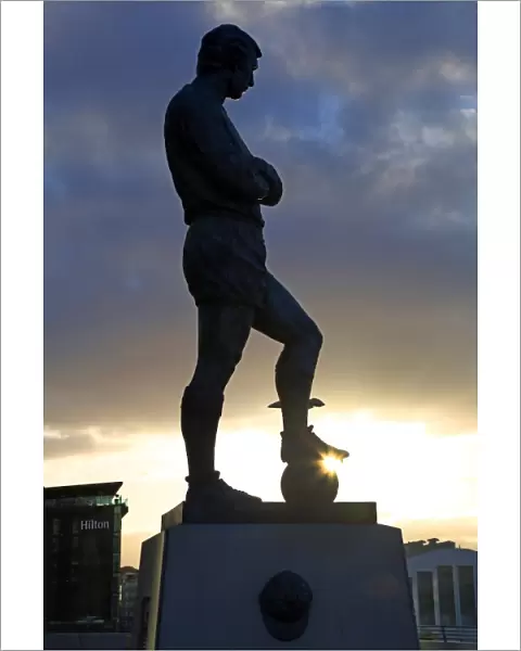Silhouette of the statue of Bobby Moore at Wembley Stadium, London, England