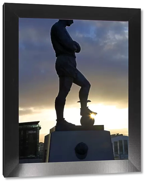 Silhouette of the statue of Bobby Moore at Wembley Stadium, London, England