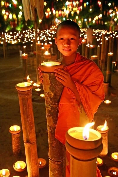 Buddhist Monk with candles, Loy Krathong, Chiang Mai, Thailand
