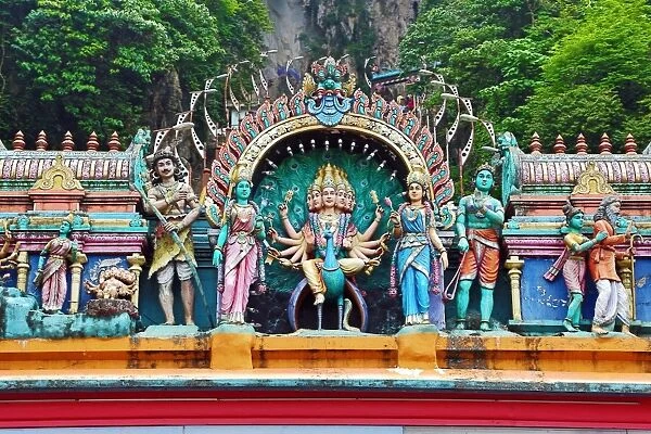 Carved figures on the entrance to the Batu Caves, a Hindu shrine in Kuala Lumpur, Malaysia