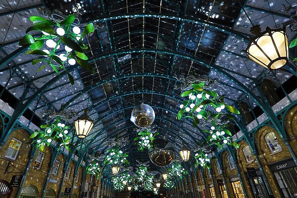 Christmas lights switched on in Covent Garden Market, London