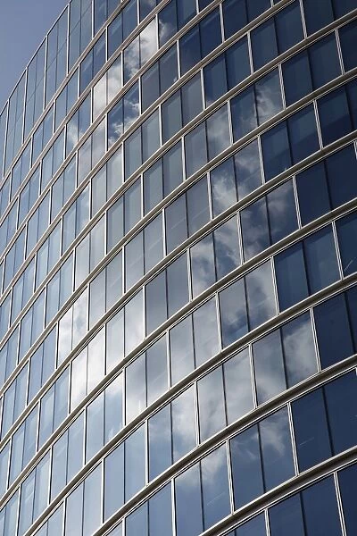 Cloud reflection in office windows