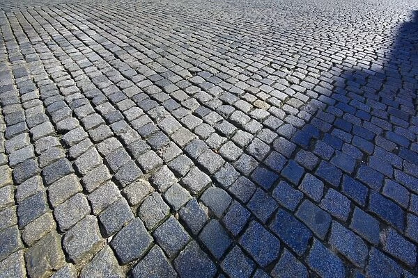 Cobblestones on a cobbled street in Prague, Czech Republic