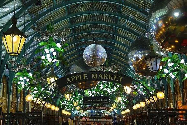 Covent Garden Christmas decorations and lights shaped like mistletoe in London
