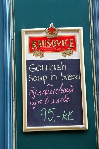 Czech menu in the street advertising goulash, soup and bread in Prague, Czech Republic