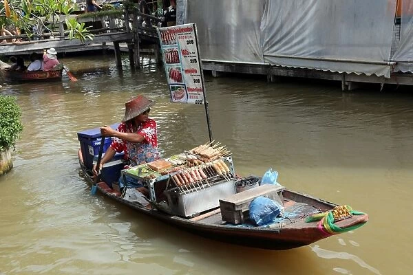 Fast Food stall on a boat at Pattaya Floating Market in Pattaya, Thailand