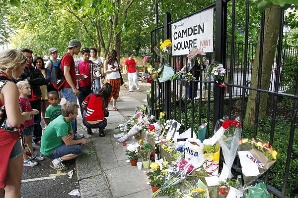 Flowers left by mourners after the death of Amy Winehouse