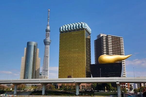General view of the city skyline in Asakusa with the Tokyo Skytree Tower and the Asahi Beer Headquarters, Tokyo, Japan