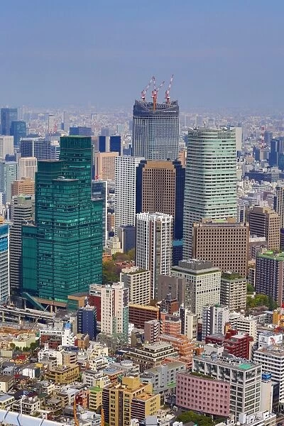 General view of the city skyline of Tokyo with high rise office buildings and skyscrapers, Tokyo, Japan