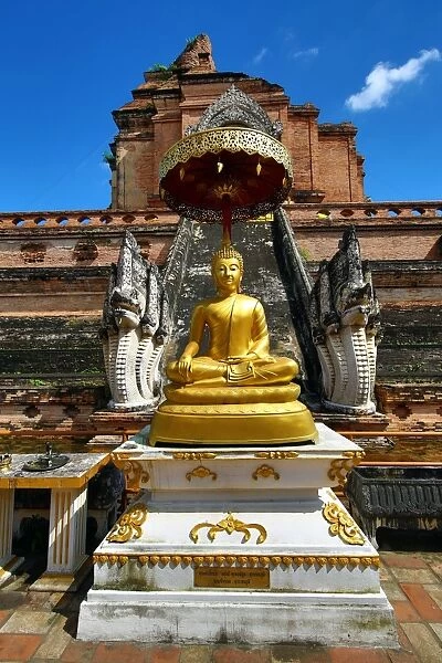 Gold Buddha statue at Chedi at Wat Chedi Luang Temple in Chiang Mai, Thailand