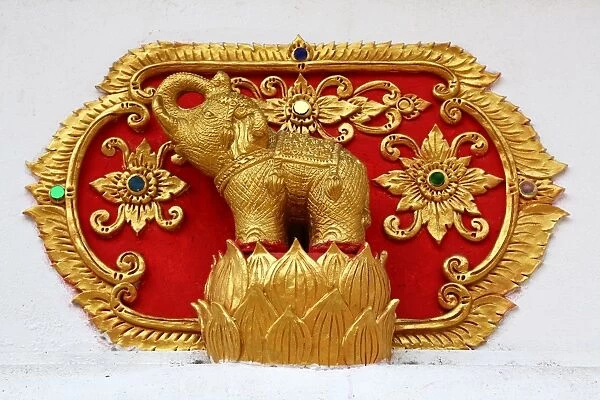 Gold elephant decoration at Wat Sum Pow Temple in Chiang Mai, Thailand