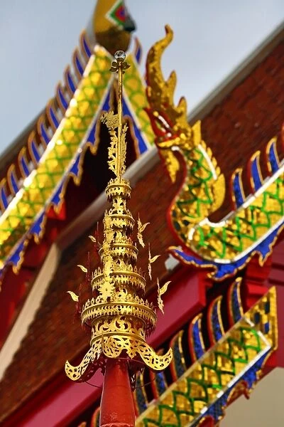 Gold naga roof decorations at Wat Panping Temple in Chiang Mai, Thailand