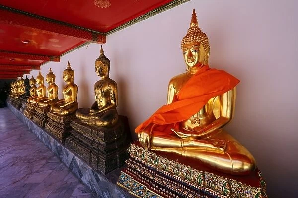 Golden Buddha statues at Wat Pho temple, Bangkok, Thailand