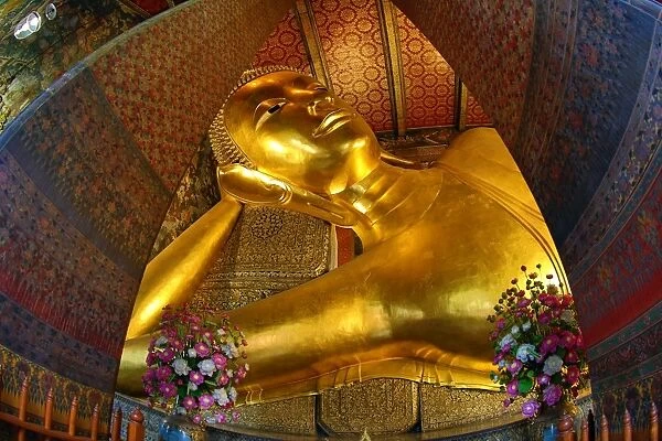Golden Reclining Buddha statue at the Wat Pho Temple Bangkok, Thailand