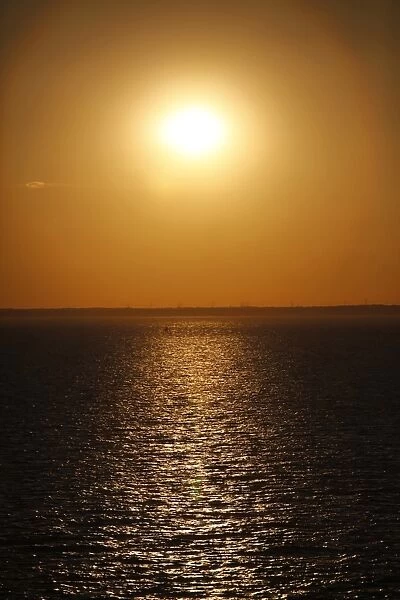 Golden sunset over the sea at dusk