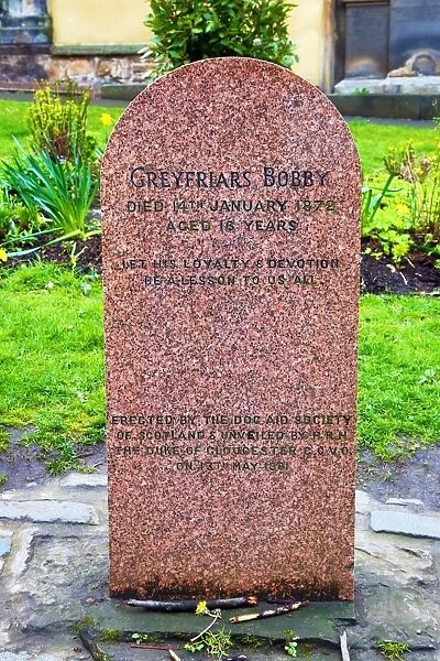 Grave of Greyfriars Bobby the loyal Skye Terrier that stayed by his masters gave