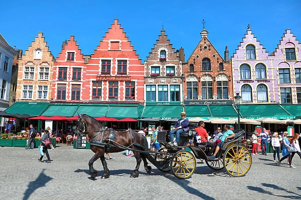 Guild houses converted into restaurants in the Market Square or Markt, Bruges, Belgium