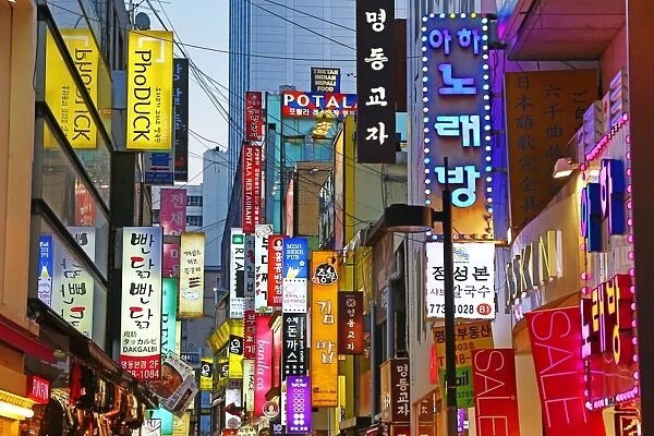 Illuminated shop signs of the shopping streets in Myeongdong in Seoul, Korea