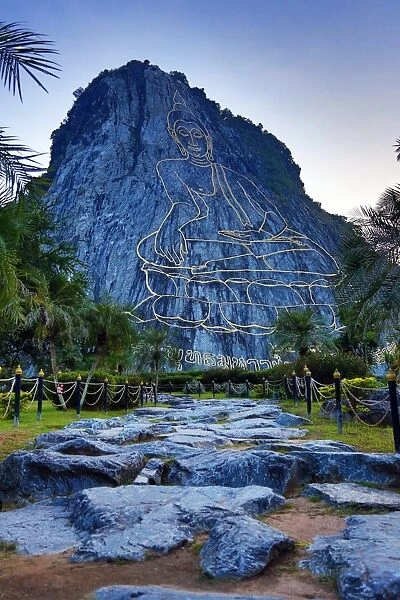 Khao Chee Chan, Buddha Mountain, Chonburi, Pattaya, Thailand a giant Sukhothai-era Buddha sculpture engraved into a cliff face