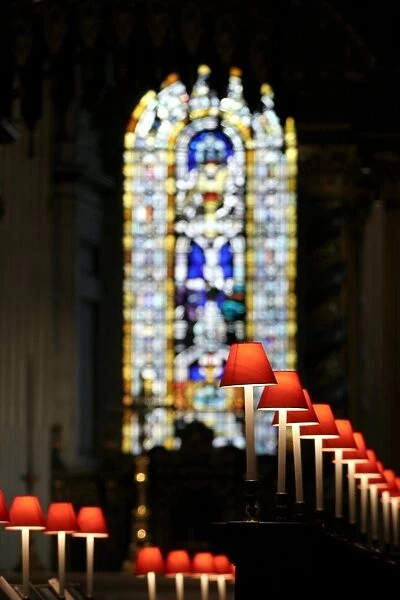 Lamps and stained glass window in St. Pauls Cathedral