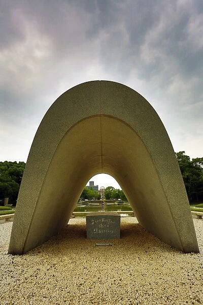 The Memorial Cenotaph and the Genbaku Domu, Atomic Bomb Dome, in the Hiroshima Peace Memorial Park, Hiroshima, Japan