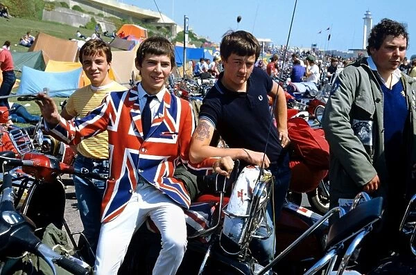 Mods in Brighton in 1982, wearing a Union Jack jacket sitting on scooters