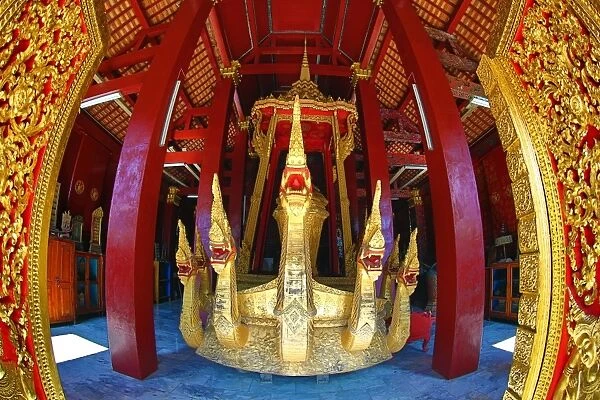 Naga on the golden ceremonial barge in the funeral chapel of Vat Xieng Thong Temple
