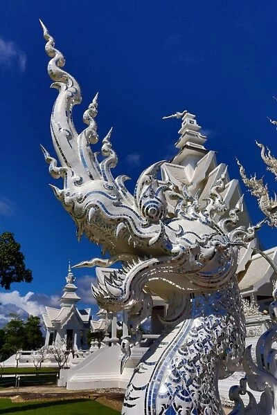 Naga snake statue at Wat Rong Khun, The White Temple, Buddhist Temple, Chiang Rai, Thailand