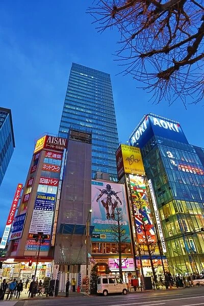 Night scene of buildings, signs and lights in the street in Akihabara, Electric Town, Tokyo, Japan