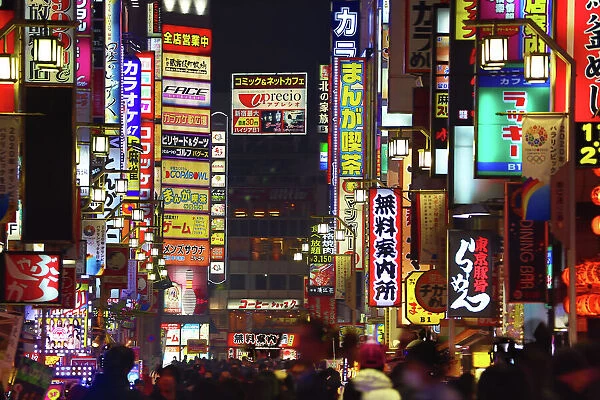 Night scene of street signs and lights in Shinjuku, Tokyo, Japan