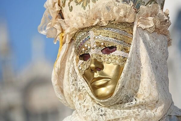 People wearing masks and costumes at the Venice Carnival