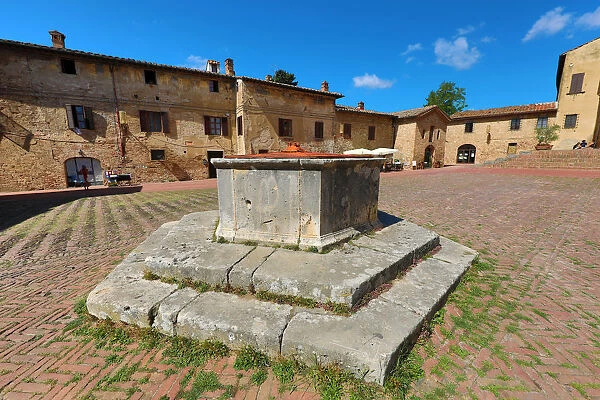 Well in the Piazza Sant Agostino in San Gimignano, Tuscany, Italy