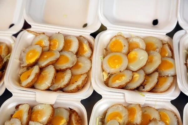 Quail eggs at a food stall at Chatuchak Weekend Market, the largest market in Thailand, Bangkok, Thailand